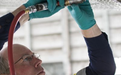 Pete Legate removing corrosion from bolt spot faces along the wing attach angle. February 2016. Pete Legate removing corrosion from bolt spot faces along the wing attach angle. February 2016.