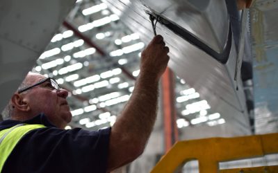 Errol fastening the left aileron at one of the attachment points. Nov 2016. Errol fastening the left aileron at one of the attachment points. Nov 2016.