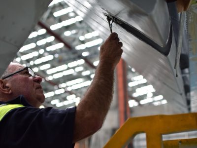 Errol fastening the left aileron at one of the attachment points. Nov 2016.