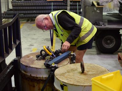 John inspecting the engine sling he designed. This will be used to lift the engine onto the aircraft for reinstallation. Feb 2017.