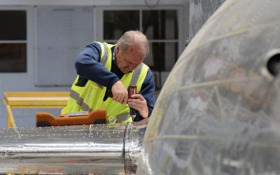 Henry working to reattach the right elevator fairing, Oct 2016. Henry working to reattach the right elevator fairing, Oct 2016.